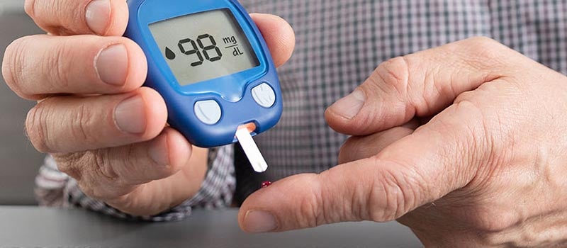 man checking glucose