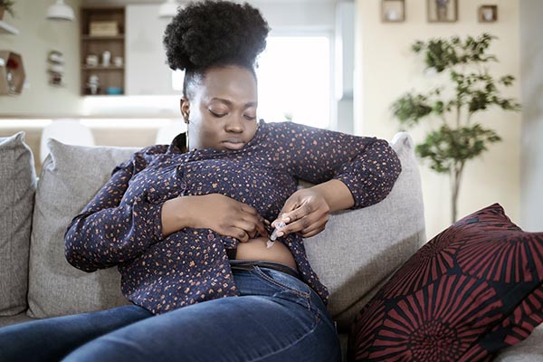 woman using weight loss drug