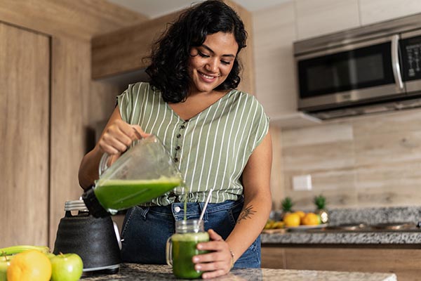 woman making drink