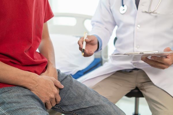 man talking to doctor