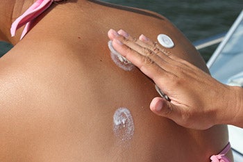 A patient receiving treatment on their upper back